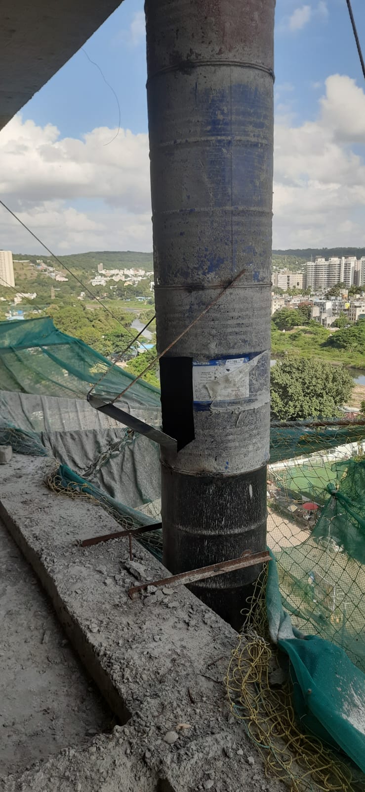 Debris chute floor inlet opening for loading construction waste from an upper floor in Pune